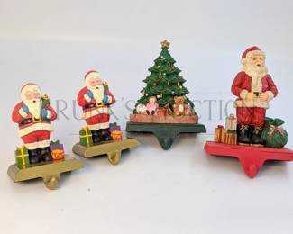 (4) CHRISTMAS STOCKING HOLDERS W/ ORIGINAL BOXES (2) LARGE (SANTA / CHRISTMAS TREE), 7" T (2) SMALL (SANTA'S), 5" T