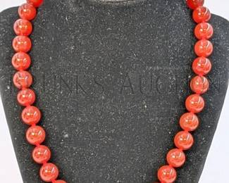 RED JADE BEAD NECKLACE (1) MALAYSIAN RED JADE BEADED NECKLACE WITH A MAGNETIC CLASP. 20"