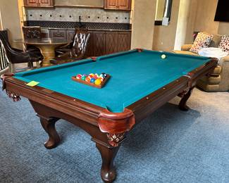 Olhausen 8 ft pool. table with cues sale price $900