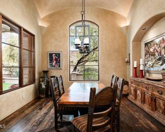 Copper Top Dining Table and six custom chairs  sideboard sold