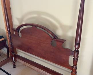 Close-up view of headboard for poster bed.