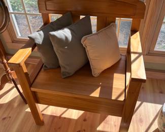 Oak chair with storage below seat.