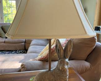Table lamp with heavy, stone-like rabbit base.