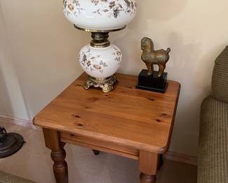 Gone With the Wind-style hurricane lamp; Trojan Horse sculpture with wood base; Pottery Barn pine coffee/side table.