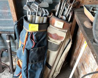 3 sets of old golf clubs