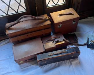 Various silver travel bottles, etc.