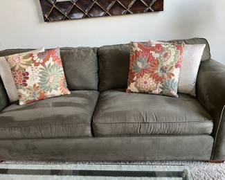 Moss green suede sofa