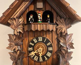 Ho clock with dancing figures