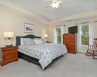 King Bed with wrap around frame. Dresser and end table got with Queen sleigh bed. Rocker.