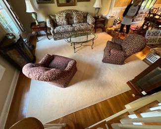 Living room furniture, artwork and rug