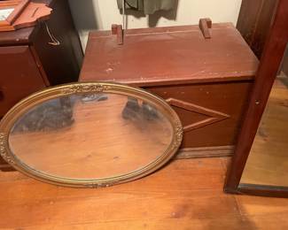 . . . oval mirror and chest