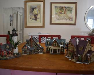 Christmas village ceramic with changing lights $120 for all, $40 each.