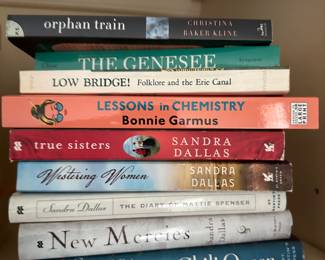 Books - fiction, non-fiction, authors included Sandra Dallas, Bonnie Garmus, others.  Orphan Train