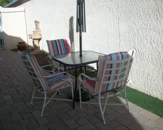 patio table, 3 chairs, umbrella stand (needs new umbrella)