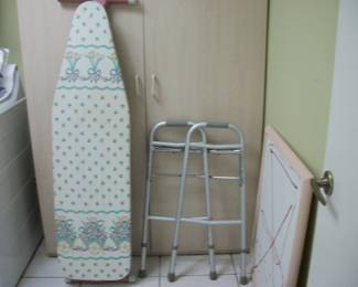 ironing board, walker, bulletin board