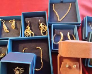 diamond studs, 18k dangles 30" chains. so yummy...but doesn't stay on site overnight