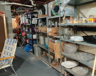 Wall of candles, party supplies, vases and more