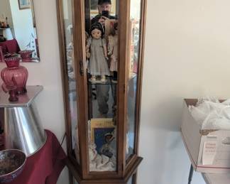 Curio, lighted full of great dolls