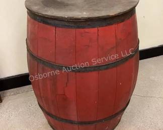 Large red wood barrel