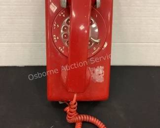 Vintage red rotary telephone