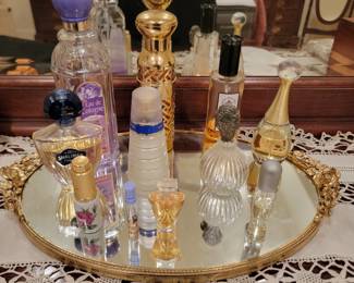Assortment of Perfume Bottles and Mirrored Dresser Tray