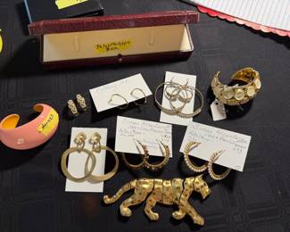 More jewelry- Simon Alcantara 14k earrings; Tiffany 18k hoop earrings; Hermes lacquer cuff bracelet; KJL cuff bracelet; Patek Philippe watch box only (no watch!)
