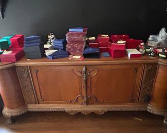 Antique buffet. Sides swing out to open 