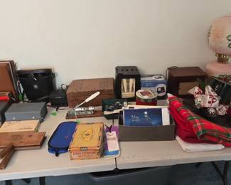 Vintage Dominos
Vintage Poloroid Land Camera 
Cigar boxes