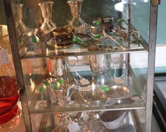 Small cabinet holding mostly sterling items, DR