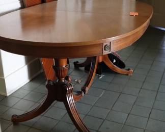 Hepplewhite, mahogany table with 2 leaves standing on side, Side entrance room