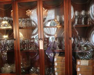 Large mahogany china cabinet, filled with crystal and glass, DR