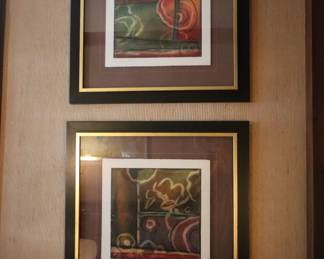 Framed, modern prints in den