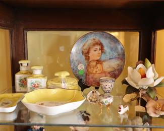 Vintage small items in glass cabinet in LR
