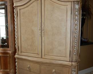 Beige armoire with bottom drawers