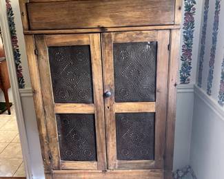Antique pie safe with punched tin doors