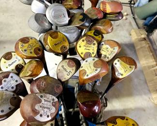 about 100 golf clubs here 