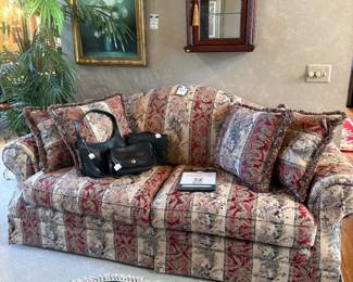 Vintage Coach City bag,  Vintage Coach Willis bag, Vintage Coach Ergo bag, American furniture sofa
Artificial plant, Robert Cox oil painting
