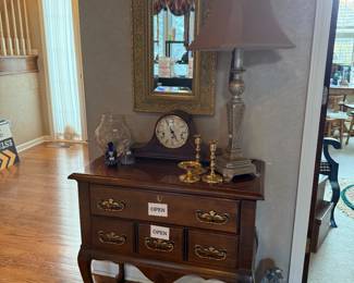 Partylite candlestick holders, Howard Miller mantle clock, Beveled gold leaf Edwardian mirror, Table lamp
