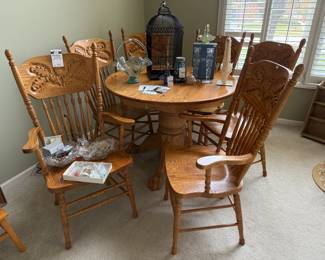 Clawfoot round oak dining table, Woodpress chairs (set of 6)
