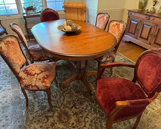 Table is paired with a set of six dining chairs, new but classic parlor style, made by Harris Marcus furniture (Chicago). Frames made in Italy, all completed and finished in USA. Dining table is made by Canadian furniture company, Canadel, see past pictures for more info.