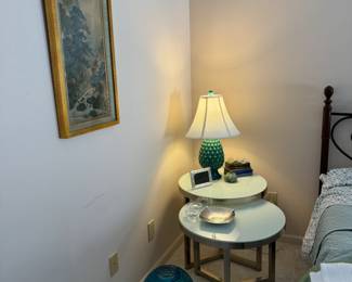 Unique "nesting" tables? But not quite because the smaller doesn't completely slide under, but they kind of come together like an eclipse. Or use them separately! Homeowner had them used separately, but I put them together for picture.