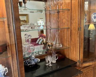 Pull-out dry bar, and so much storage! Center piece is 73" long, each corner cabinet adds 19.5" to total length (112" x 20" deep). Breaks down to several pieces.