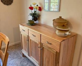 Amish-made, Palettes by Winesburg, wormy maple, contemporary kitchen table with 4 chairs and 1 additional leaf. Set was special ordered from Carter's Furniture in 2020. Homeowner paid $2800 for table and chairs. There is a matching credenza/sideboard as well. One of the best sets we've sold of the year in my opinion, the wormy maple is just stunning. Comes with speciality oil purchased with table. A MUST-SEE! Owner was very sad the set didn't fit into her new home! Look up Palettes by Winesburg to find out more info on this high quality American company.