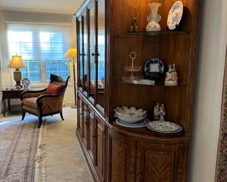 American of Martinsville lighted breakfront cabinet with pull-out dry bar, and so much storage.