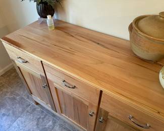 Amish-made, Palettes by Winesburg, wormy maple, contemporary kitchen table with 4 chairs and 1 additional leaf. Set was special ordered from Carter's Furniture in 2020. Homeowner paid $2800 for table and chairs. There is a matching credenza/sideboard as well. One of the best sets we've sold of the year in my opinion, the wormy maple is just stunning. Comes with speciality oil purchased with table. A MUST-SEE! Owner was very sad the set didn't fit into her new home! Look up Palettes by Winesburg to find out more info on this high quality American company.