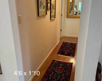 These two Persian rugs are identical. They are each 4'6 x 1'10. See next pictures for close-ups of artwork