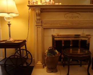 An antique French tea cart, along with two other French antique pieces: a large decorative ceramic pot w/beautiful fruit laden lid and spigot; small oval table with a lift-off tray.