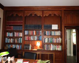 Overall view of the Den/Library. The wood millwork was designed in 1936 by Elmer Stuck for the Patton family. At that same time the room was enlarged by removing a fireplace. In addition, he designed all of the porches to be added in 1937.
