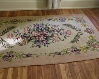 Vintage handmade hook rug. It came from the French home, on Metzler, built by Dr. and Mrs. Rainey. 