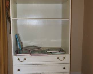 Heavy, tall storage cabinet in upstairs bedroom. 